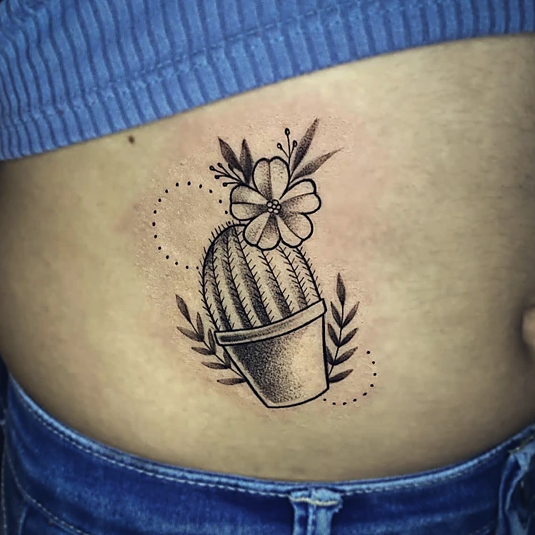 Cactus en maceta con una flor, hojas y círculo punteado, en línea y puntillismo, en el costado